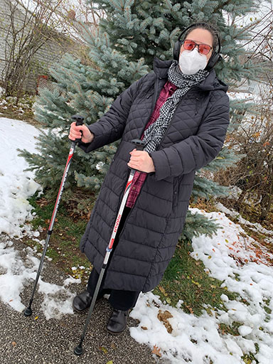 Julie S. was in a car accident and suffered a concussion that resulted in severe vestibular dysfunction. Today she uses walking poles as part of her rehabilitation.