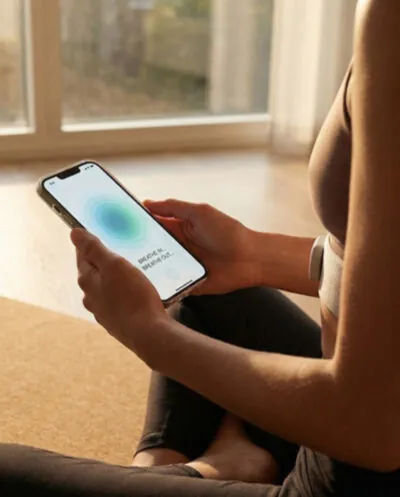 Woman viewing app on cellphone.