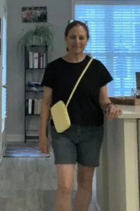 Karen is showing the shoulder bag for her phone