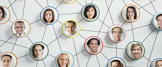 smiling faces connected by web-like lines.